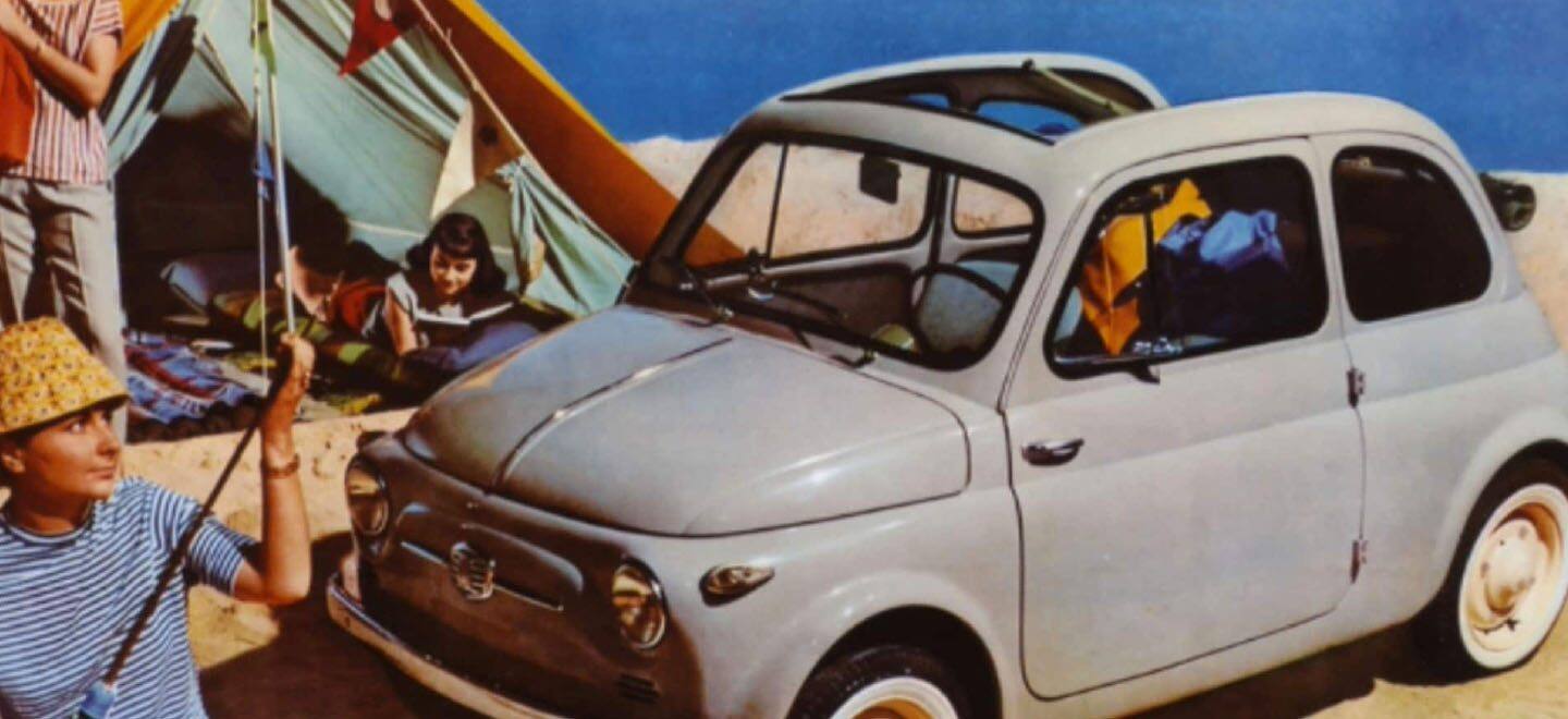 Display A vintage drawing of a classic gray Fiat Cabrio at a beach with people camping nearby.