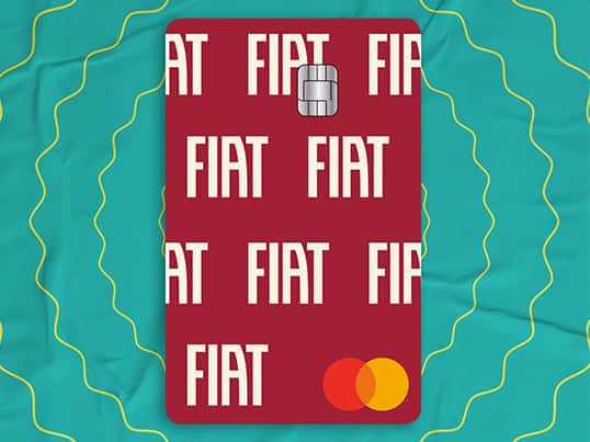 A red Fiat DrivePlus Mastercard on an aqua-blue background.